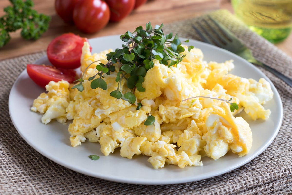 Scrambled eggs with fresh microgreens